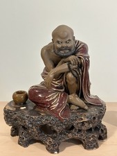 Handcrafted Buddhist Monk Figurine – Detailed Ceramic Sculpture on Textured Base