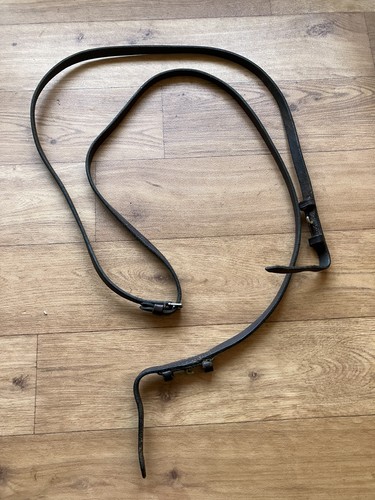 Brown leather reins made - , in