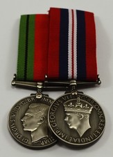 Pair of Full Size Replica WW2 Service Medals. 1939-1945 Defence, George VI
