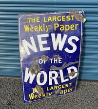 Large Vintage Enamel News Of
