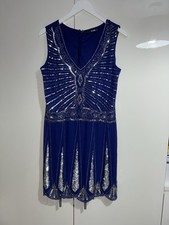 Quiz blue and silver sequin
