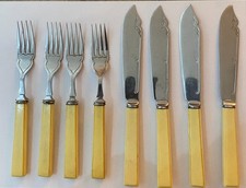 Vintage Faux Bone Handled Forks and Knives ?