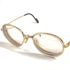 - Cartier Trinity Gold Metal