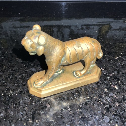 Vintage brass tiger - on, an