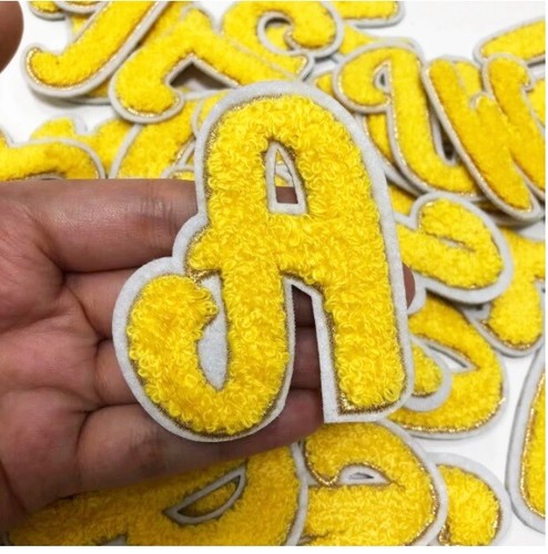 Yellow gold chenille patch - &,
