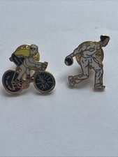 Two Sports Metal Badges