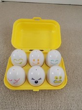 TOMY TOOMIES PLAY TO LEARN HIDE N SQUEAK EGGS BABY TOY 