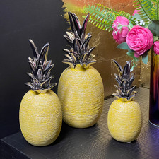 Yellow And Silver Ceramic