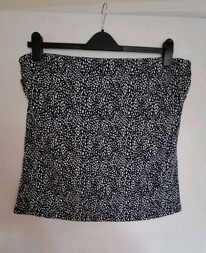 Black and white strapless - and,