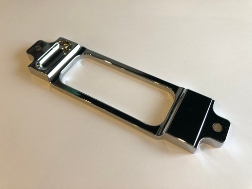 Chrome bezel with thumb recess - bezel,