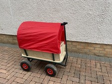 Kids Pull Along Wagon. Wooden with Red Canopy. Can be used as a cart or sit in.