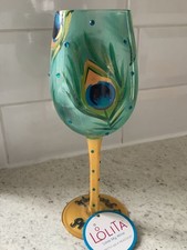Lolita wine glass "Pretty as a Peacock" displayed only. With tag.