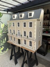 Very large wooden dolls house and cabinet. Ashcombe Manor