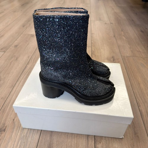 Margiela glitter hunter - a/w,