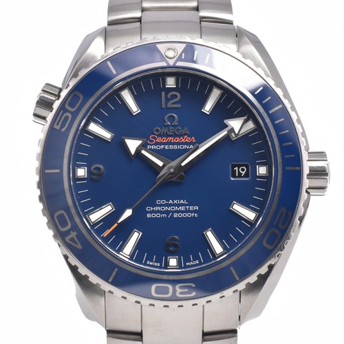 With paper omega seamaster - with,