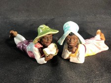 GOOD PAIR OF GERMAN BLACKAMOOR STYLE POTTERY HAND PAINTED FIGURES.
