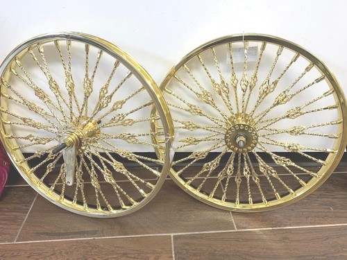 Caged twisted gold bicycle - caged,