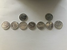 7 x Man In Flight Coins From