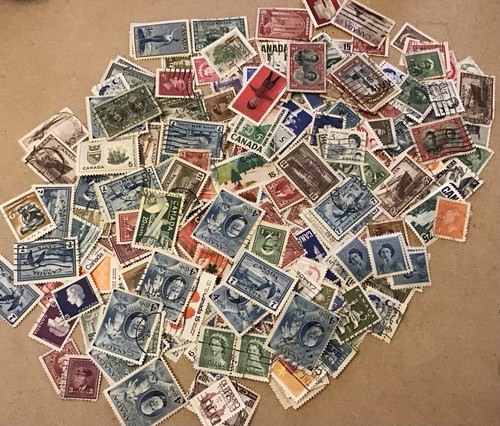 100 canadian stamps - 100’s, of
