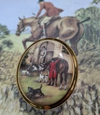 An Aynsley trinket box of foxhunting interest with   a horse and hound scene.