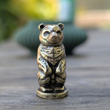Brass bear with log - bear,