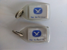 Mann Egerton dealer keyrings, London, 1970s  matching pair VGC