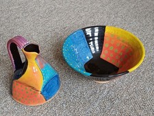 John Pollex ceramic mug & dish - slipware with vibrant polychrome decoration.