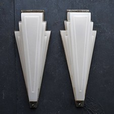 Matched pair of art deco opaline glass English cinema wall lights