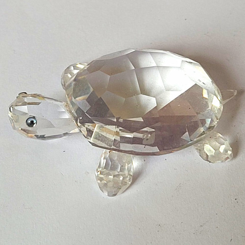 Unmarked clear faceted crystal - clear,