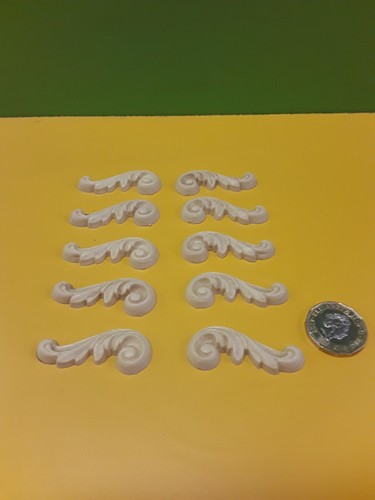 Pair decorative scrolls - pair,