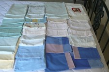JOB LOT 33 PILLOWCASES mostly poly-cotton, plain / patterned, all good condition