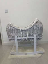 White wicker pod moses basket with rocking stand in VGC c/w white waffle bedding