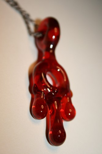 Orange elvis drippyo pendant - elvis,