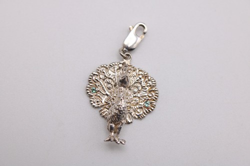 Milano silver clip peacock - on,