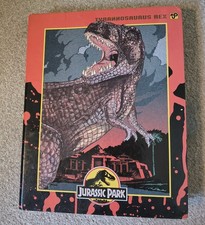 Jurassic Park Memorabilia Including A Folder, Several Magazines And Newspaper