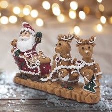 Gingerbread santa sleigh with - santa,
