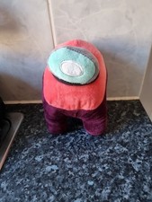 official Among Us plush toy.