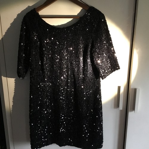 Red herring fab black sequin - red,