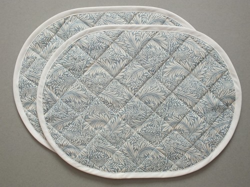 Pair quilted oval - of, table