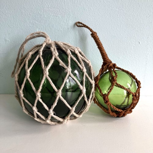 Green glass netted fishing - glass,