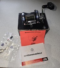 Abu Ambassadeur C4 Series 6501C4 with Power Handle and 53lb Power Pro Braid 