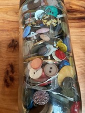 job lot of mixed buttons in 2 jars. i would say that a number of them are old