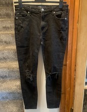 Ladies Primarks Black ripped / distress Skinny Jeans. Size 14.. GC