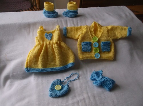 Hand knitted yellow - hand, blue