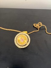 Gold Tone Religious Pendant