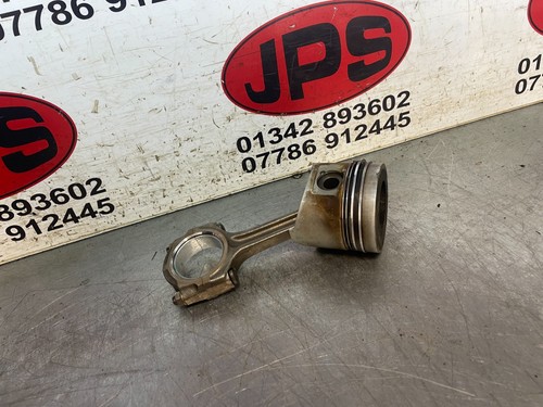 Piston with con - , x