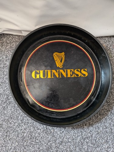 Vintage guinness serving - guinness,