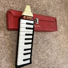 Vintage collectibles Hohner Melodica piano harmonica with original red Case 