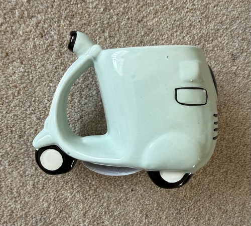 Scooter shaped ceramic - shaped,