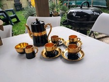 Gibson & Sons Late Sevres Davenport Coffee Service. Black glaze with gold
